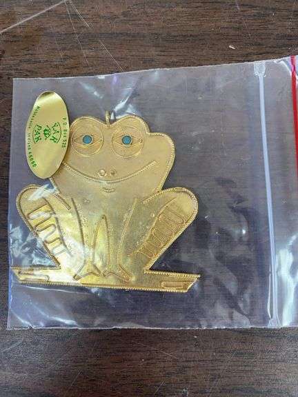 Bag of Kashmir India PAK YAK, metal ornaments, 55 frogs image