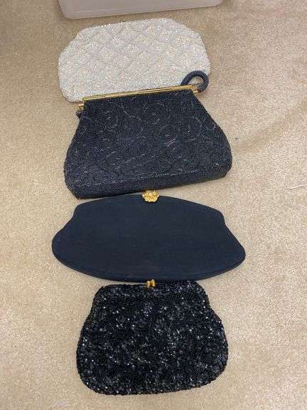 Four ladies hand clutches image