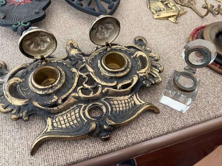 Miscellaneous trivets,  ink wells , brass hooks miniature birds and Rhapsody In Blue album image