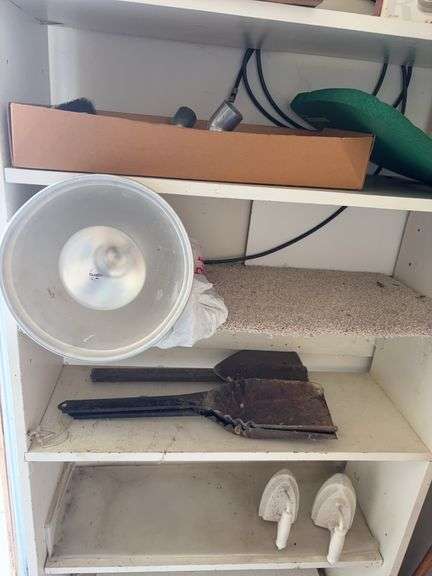 Sad irons, coal scoops, heat lamp, misc image