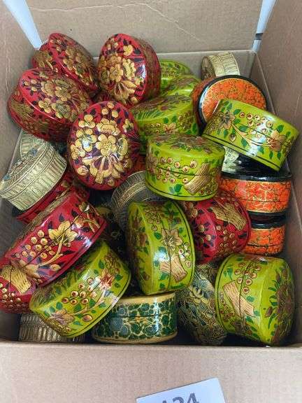 Box of Kashmir India PAK YAK, hand made and painted oval and round lidded boxes, green, orange, red and gold, 23 metal round, 4 small round paper mache, 29 oval paper mache image
