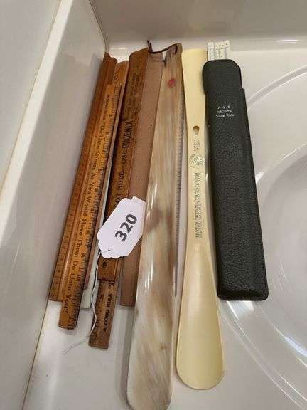 Shoe horns and vintage rulers image