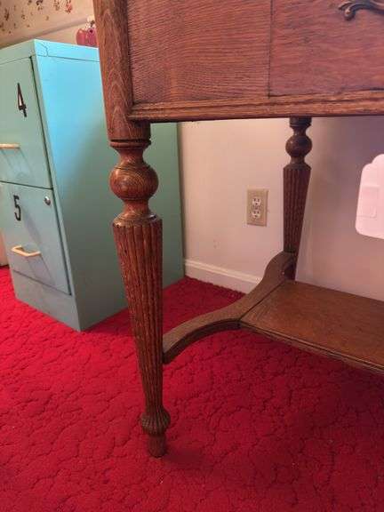 Writing desk with 1 drawer and contents  42” w x 26” d x 29” h cracks on top
