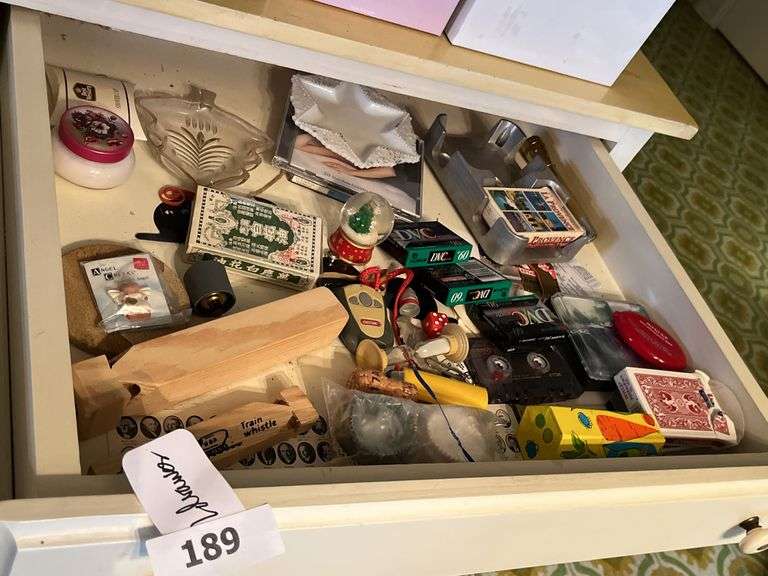 Back scratcher, cast iron frame, wood train whistles, playing cards
