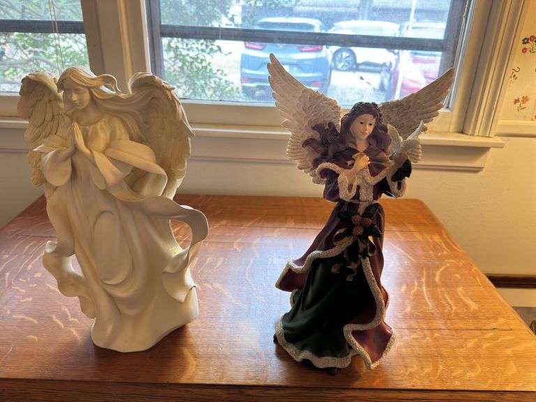 Shelf of misc Christmas items: angels by Home Interior