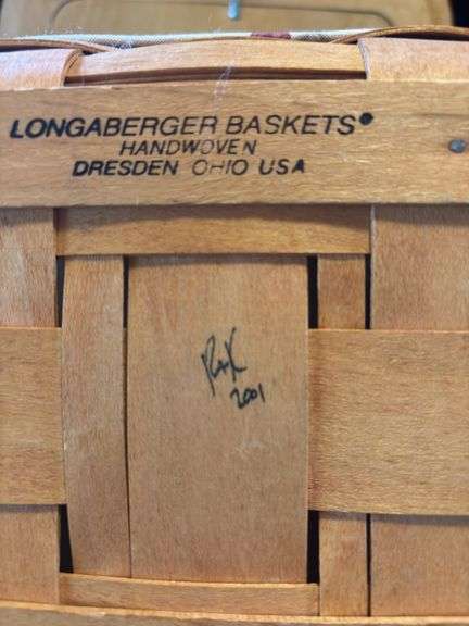 Longaberger Classic pie basket with botanical gardens liner/protector and copper tin punch insert in lid that is an aftermarket addition .