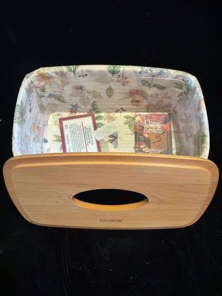 Longaberger classic baskets : long tissue box with botanical garden liner and protector dates 2001, vanity basket with botanical gardens liner and protector dated 2001, and 2003 notepad basket with botanical garden liner / protector and lid . Vanity basket has spare holly liner also .