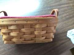 Longaberger classic Knick knack  basket with burgundy liner and protector ,dated 2004. Button basket with 3 way divided protector dated 2004.
