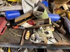 Contents of Work bench & contents (excluding saw sharpener)