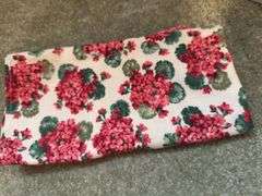 Mirrored decorative folding screen, Longaberger crock, floral napkin