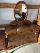 Ethan Allen maple seven drawer dresser with mirrored back