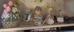 Top shelf of miscellaneous ceramic pieces