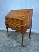Davis Cabinet Company drop-front Secretary in furnished cherry finish