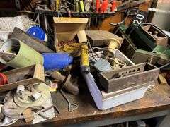 Contents of Work bench & contents (excluding saw sharpener)