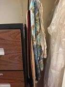 Neckties, twin bed spread, table scarf