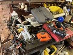 Contents of Work bench & contents (excluding saw sharpener)