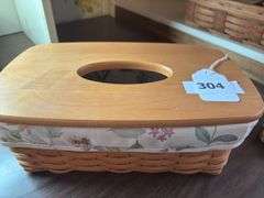 Classic long tissue box with botanical gardens liner and protector dated 2002.