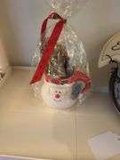 Shelf of misc Christmas items: angels by Home Interior