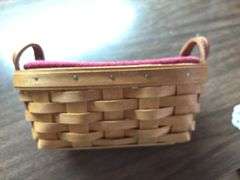 Longaberger classic Knick knack  basket with burgundy liner and protector ,dated 2004. Button basket with 3 way divided protector dated 2004.