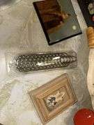 Plastic serving bowl, lighthouse wall hanging, sand painting mini picture, 2 cat mugs, hairdryer, back scratcher, shower curtain hooks