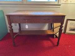 Writing desk with 1 drawer and contents  42” w x 26” d x 29” h cracks on top