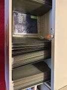 2 drawer file cabinet with key and items in drawers. 18” x 35” x 28” h