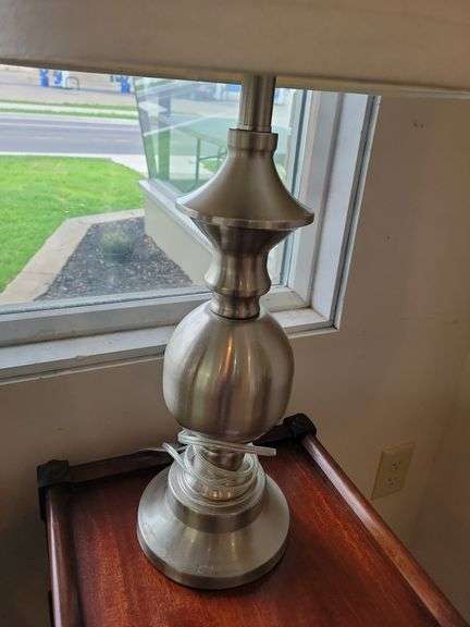 Pair of Lamps - Black Shade w/Brass Base  28"t; Cream Shade w/Silver Metal Base 26"t