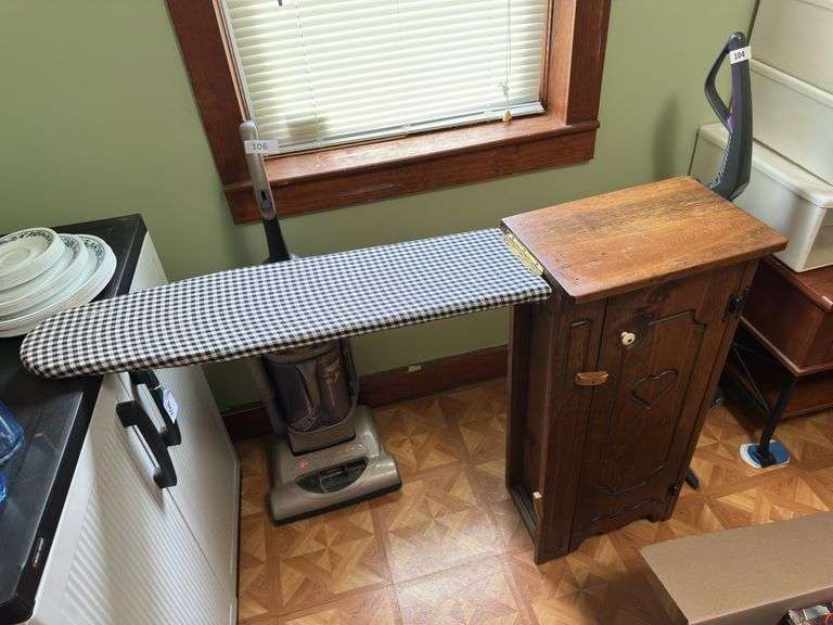 Cabinet with fold ironing board