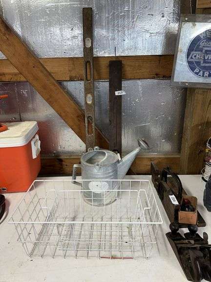 2 levels, watering can, wire baskets