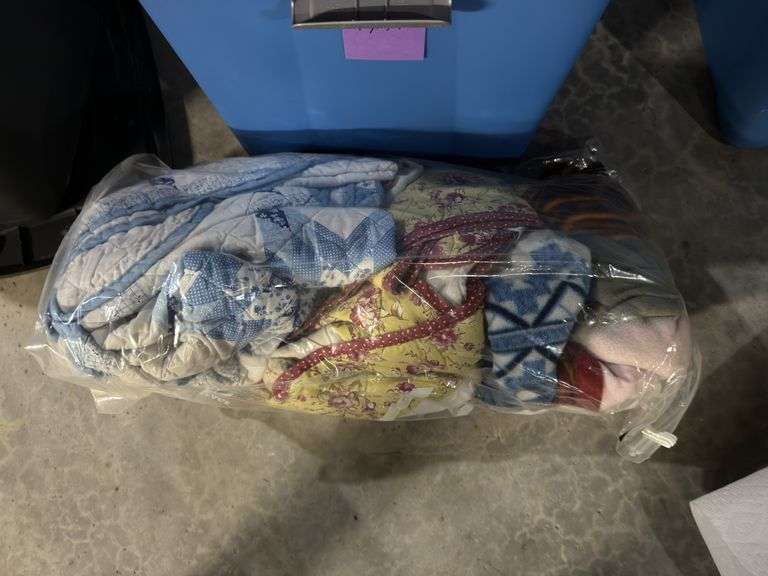 Tub of quilts & blankets