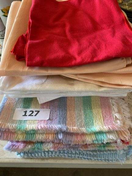 Place mats, linen napkins, lace table mats