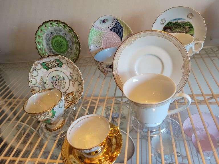 China Tea Cups and Saucers (including plastic stands)