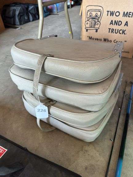2 boat seats, fishing rods and tackle box