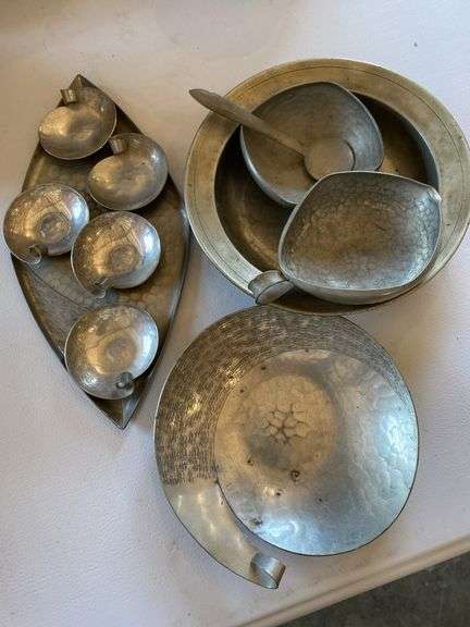 Hammered aluminum and pewter pieces, teapot, tobacco container, pitchers, vase