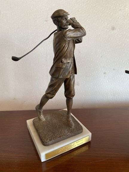 Golf brass figurines, cast iron bookends, plate