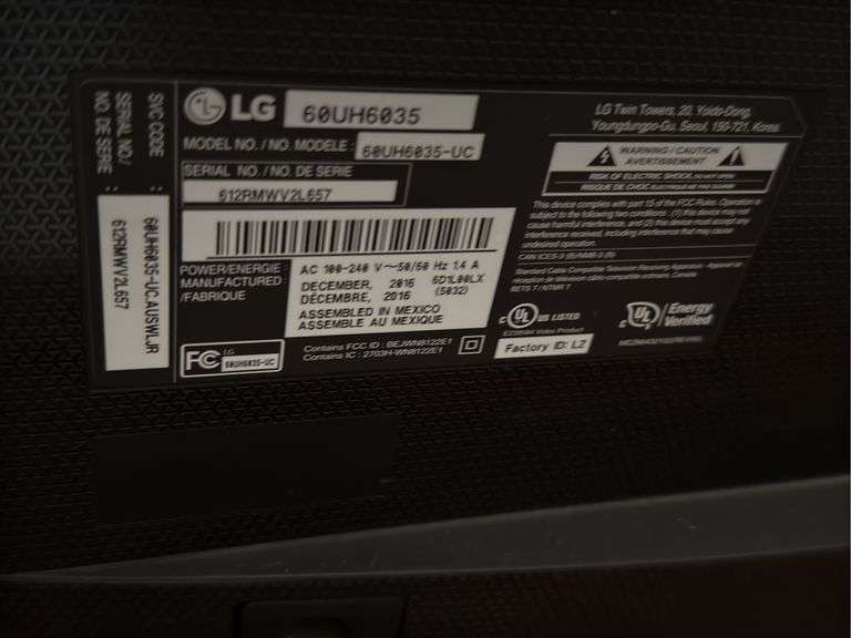 60" LG television with remote