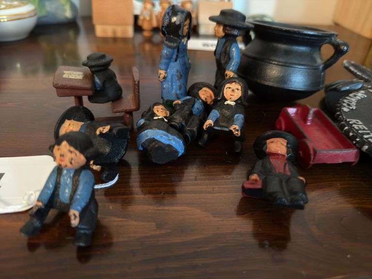 Cast iron figures & trivet