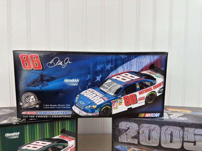 4 die-cast Nascar collector cars