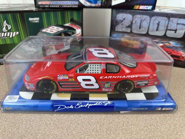 4 die-cast Nascar collector cars
