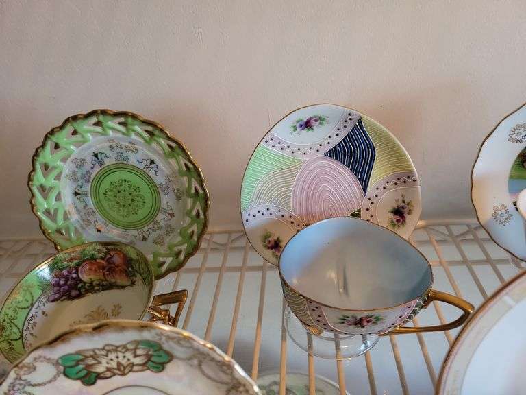 China Tea Cups and Saucers (including plastic stands)