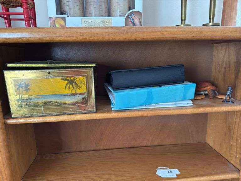 Led candle set, pair of candle holders made from WW II shell casings, tin box, photo albums, misc