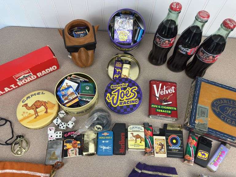 Misc Camel and Smokin’ Joe’s lighters, tins, crown bags, cigar box, coca-cola collector bottles Nascar themed