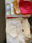 Place mats, linen napkins, lace table mats