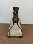 Liquor decanters in silver plated stand