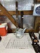 2 levels, watering can, wire baskets