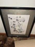 Lot of wall hangings and pictures
