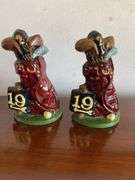 Golf brass figurines, cast iron bookends, plate