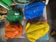 4 concrete frogs