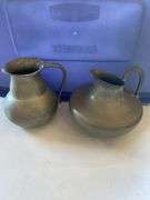 Hammered aluminum and pewter pieces, teapot, tobacco container, pitchers, vase