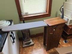 Cabinet with fold ironing board